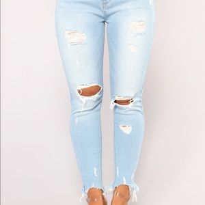 Mid Rise Distressed Ankle Jeans